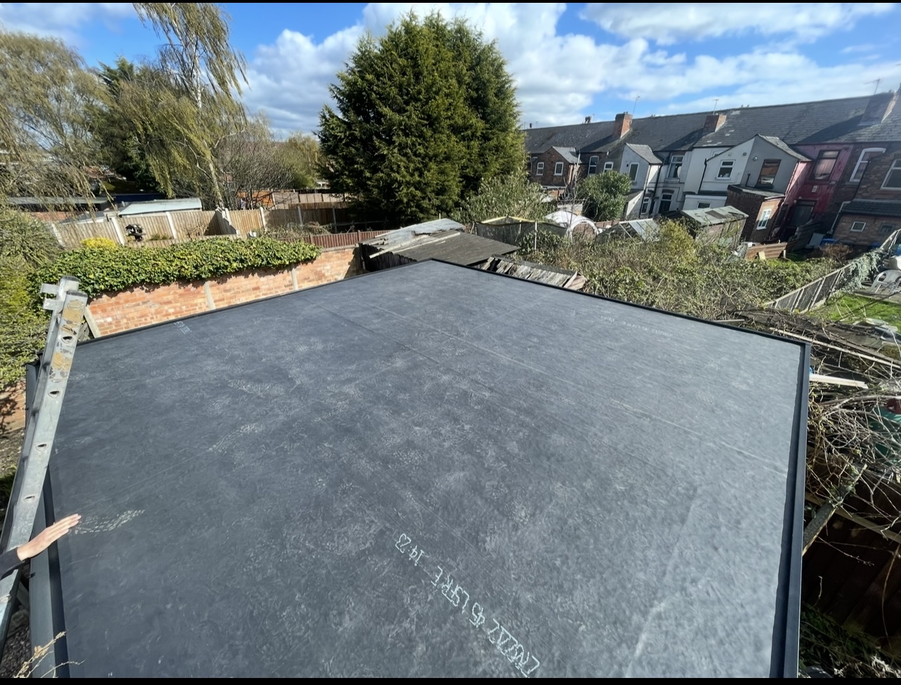Rubber roof installation — First Choice Roofing project